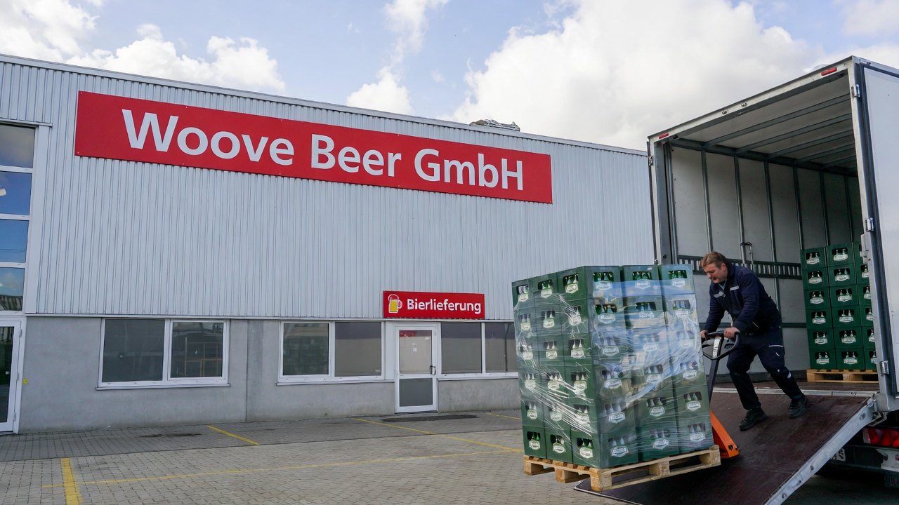 Woove Beer warehouse and truck loading wholesale beer pallets in Germany